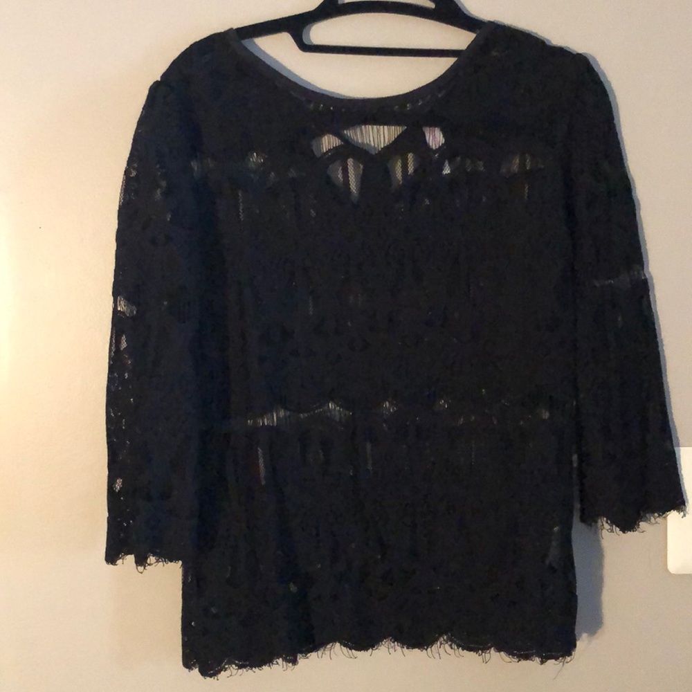 Three quarter sleeve lace shirt